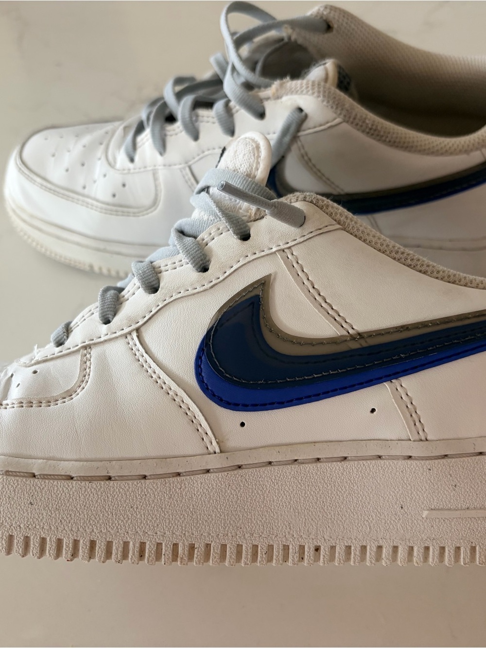 Nike Airforce 1 White Leather Sneakers with Blue and Gray Layered Swoosh